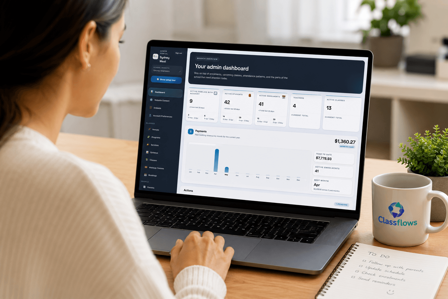 Administrator viewing the Classflows dashboard on a laptop